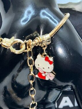 Hello Kitty Gold Bracelet Set with Red and Yellow Enamel Charms